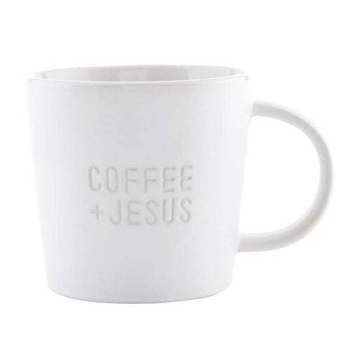 White mug with 'COFFEE + JESUS' text on a white background