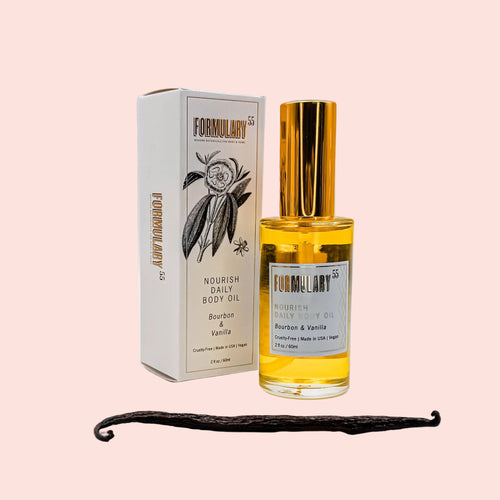 Bottle and box of Formulary 55 Bourbon Vanilla body oil on a white background