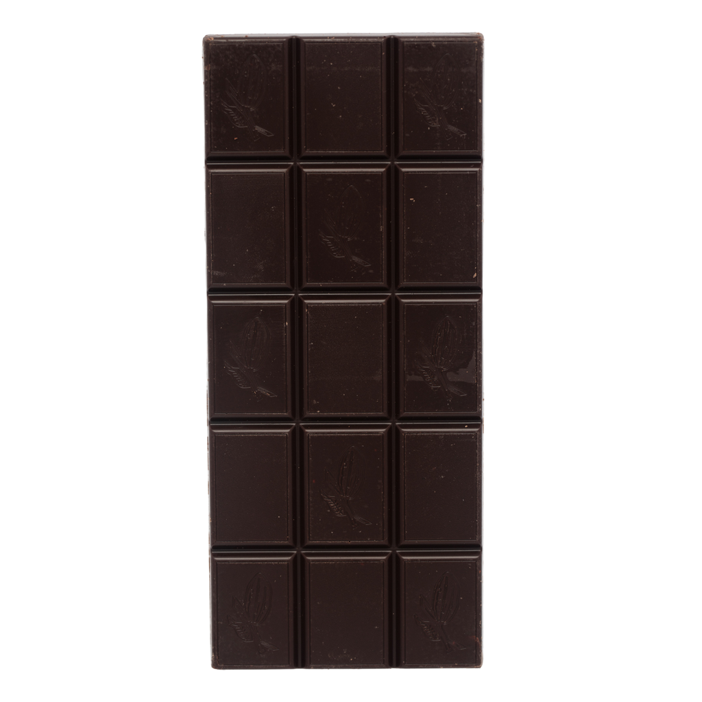 Dark chocolate bar with square pieces on a white background