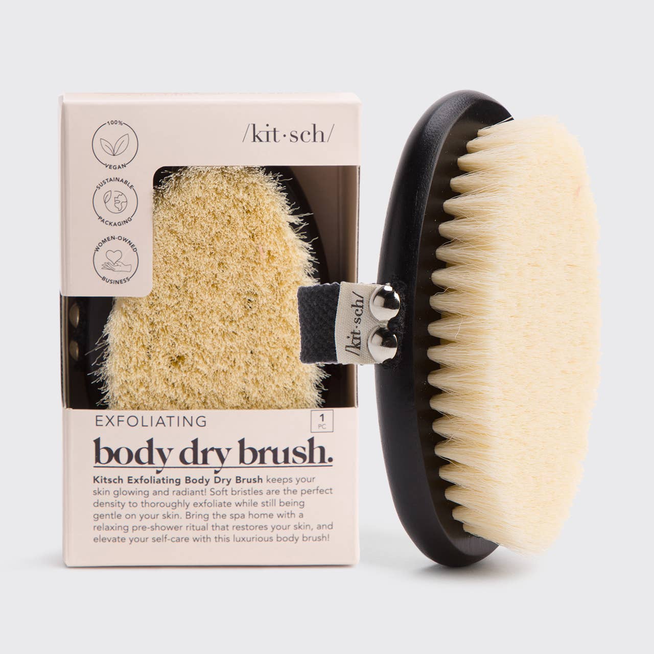 Exfoliating body dry brush with packaging on a white background