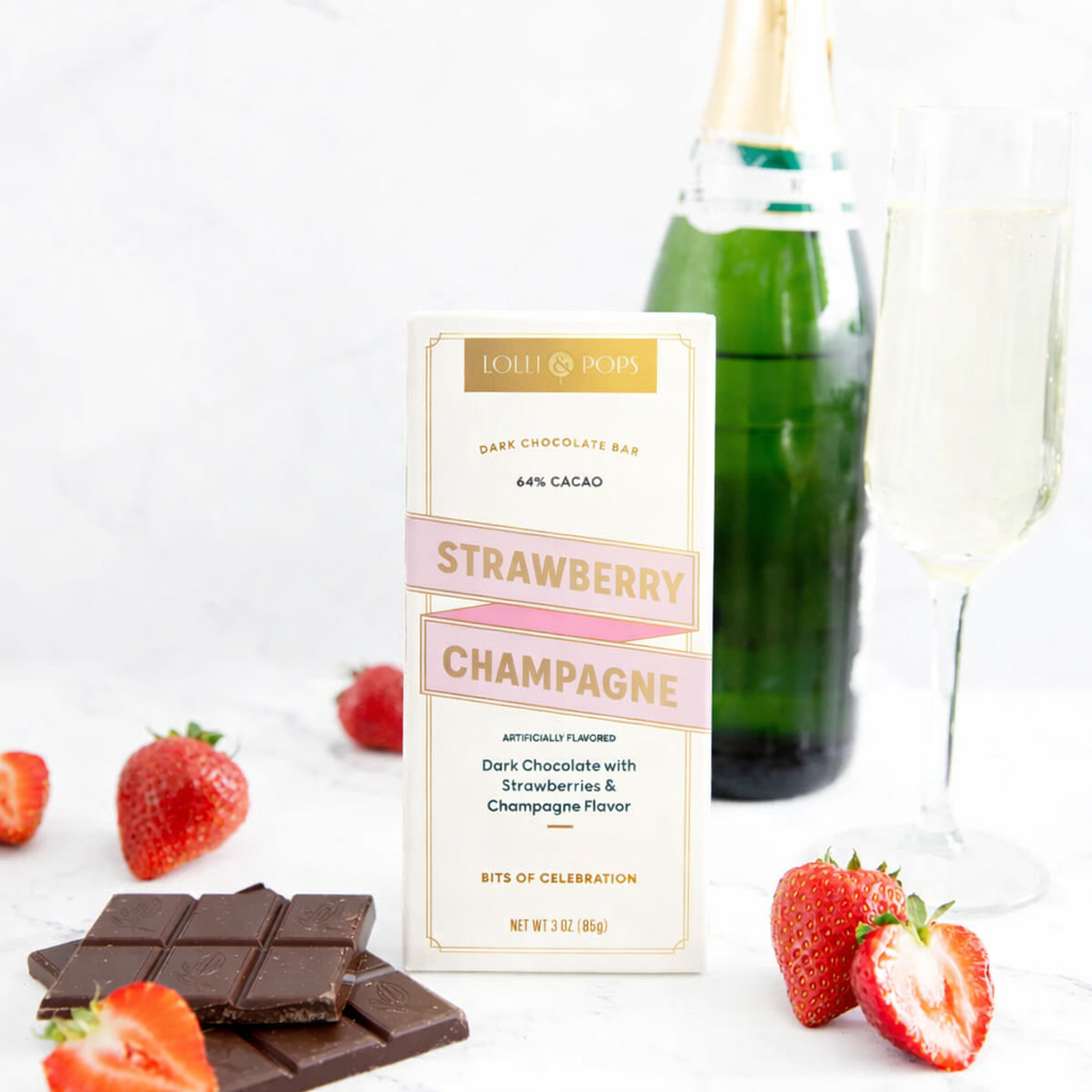 Lolly Pop Strawberry Champagne chocolate bar with strawberries and champagne bottle on a white background