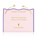Bracelet packaging with 'Heart to Heart' message and 'Lucky Feather' branding.