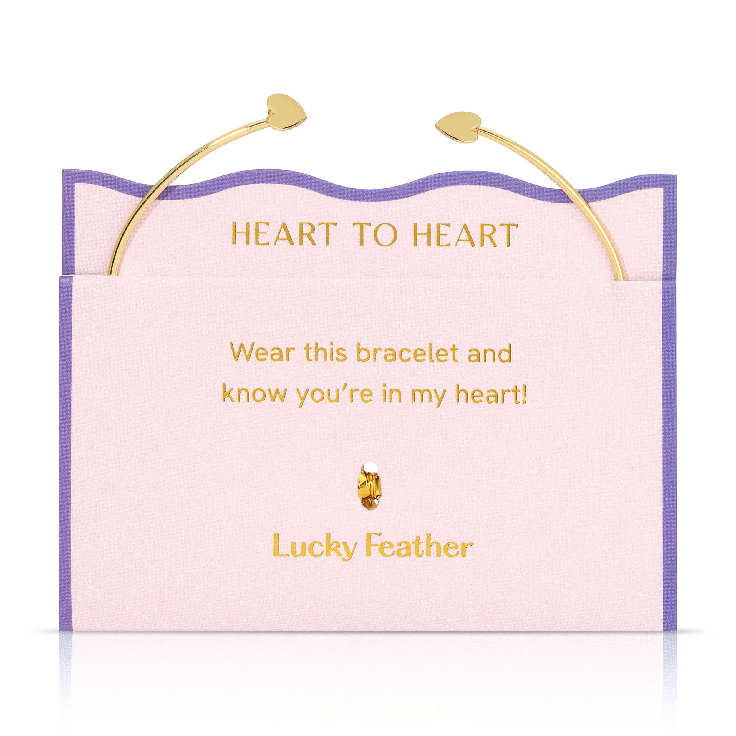Bracelet packaging with 'Heart to Heart' message and 'Lucky Feather' branding.
