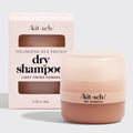 Kit Sch dry shampoo container and packaging on a light gray background